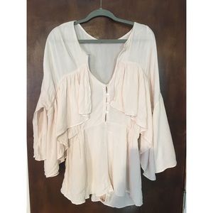 She’s a Vision Free People Romper